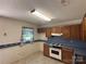 Modest kitchen with ample cabinetry and practical appliances, offering a functional cooking space at 401 Overlook Dr, Monroe, NC 28110