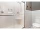 Bright bathroom featuring an enclosed shower, tiled walls, and modern fixtures at 408 Idlewood Dr, Kannapolis, NC 28083