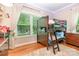 Bedroom with a bunk bed, wood floors, and natural light from a large window at 408 Idlewood Dr, Kannapolis, NC 28083