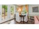 Dining area with hardwood floors, bright windows and a view of the outdoor patio at 408 Idlewood Dr, Kannapolis, NC 28083