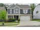 Beautiful two-story home with a stone-accented garage and well-maintained front yard at 4174 Charlton Rd, Fort Mill, SC 29715