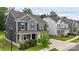 Two-story home with stone accents, a well-maintained lawn, and a convenient driveway at 4174 Charlton Rd, Fort Mill, SC 29715