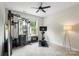 Bright home gym equipped with weightlifting and exercise equipment and a ceiling fan at 4174 Charlton Rd, Fort Mill, SC 29715