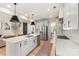 Bright eat-in kitchen with stainless appliances, subway tile backsplash and large island with seating at 4174 Charlton Rd, Fort Mill, SC 29715