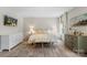 Bright main bedroom with carpeted floors and plenty of natural light from large windows at 4174 Charlton Rd, Fort Mill, SC 29715
