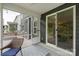 View from screened-in porch of patio and rear exterior of house at 4174 Charlton Rd, Fort Mill, SC 29715