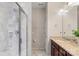 Bright bathroom featuring a glass-enclosed shower, a granite-topped vanity, and modern fixtures at 4313 Courtly Ln, Belmont, NC 28012