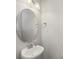 Clean powder room features a round mirror and sleek sink at 4313 Courtly Ln, Belmont, NC 28012