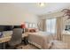 Comfortable bedroom with a desk setup, perfect for working or studying from home, and cozy decor at 4313 Courtly Ln, Belmont, NC 28012