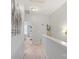 Bright upstairs hallway offers access to the bedrooms, neutral decor, and inviting spaces at 4313 Courtly Ln, Belmont, NC 28012
