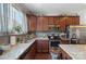 Modern kitchen featuring stainless appliances and granite countertops at 4313 Courtly Ln, Belmont, NC 28012