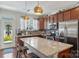 Well-appointed kitchen with granite counters and stainless steel appliances at 4313 Courtly Ln, Belmont, NC 28012