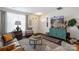 Cozy living room featuring stylish decor, ample natural light, and comfortable seating arrangements at 4313 Courtly Ln, Belmont, NC 28012