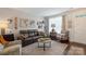 Spacious living room with chic décor, natural light, and comfortable seating at 4313 Courtly Ln, Belmont, NC 28012