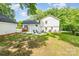 Expansive backyard with a fire pit and seating, perfect for outdoor gatherings at 437 Chadmore South Dr, Charlotte, NC 28270