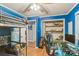 Blue room with bunk bed, a gaming setup, walk-in closet and hardwood floors at 4424 Huntington Dr, Gastonia, NC 28056