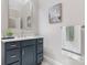 Stylish bathroom with gray vanity and elegant fixtures at 4616 Gold Finch Dr, Denver, NC 28037