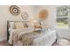 Inviting bedroom with decorative wall baskets and natural light at 4616 Gold Finch Dr, Denver, NC 28037