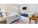 Comfortable bedroom with blue accents and soft, natural light at 4616 Gold Finch Dr, Denver, NC 28037