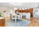Cozy dining room with chandelier lighting adjacent to the kitchen at 4616 Gold Finch Dr, Denver, NC 28037
