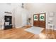 Bright foyer with hardwood floors, high ceilings, and a decorative welcome station at 4616 Gold Finch Dr, Denver, NC 28037