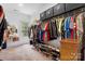 Walk-in closet with built-in storage solutions including shelves, rods, and drawers, offering ample space at 4616 Gold Finch Dr, Denver, NC 28037