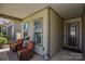 Inviting front porch featuring comfortable seating and a welcoming entryway at 464 Granite Lake Ct, Denver, NC 28037