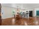 Charming kitchen area with modern appliances, and cozy breakfast area with natural lighting at 4916 Ritchie Rd, Lincolnton, NC 28092
