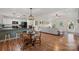 Inviting open floor plan with modern kitchen, cozy dining area, and comfortable living space at 4916 Ritchie Rd, Lincolnton, NC 28092