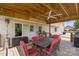 Spacious covered patio with outdoor seating, patio heater, grill, and dining area at 4916 Ritchie Rd, Lincolnton, NC 28092