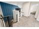 Hallway with a view of an office space, a staircase, and carpet flooring throughout the space at 5014 Forest Hills Pl, Fort Mill, SC 29707