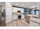 Eat-in kitchen with white cabinets, granite counters, and stainless appliances at 5014 Forest Hills Pl, Fort Mill, SC 29707