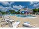 Community pool area with slides and colorful mushroom fountains offers Gathering fun and recreation at 5014 Forest Hills Pl, Fort Mill, SC 29707