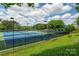 Well-maintained community tennis courts provide a great space for recreational play and exercise at 5014 Forest Hills Pl, Fort Mill, SC 29707