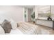 Relaxing bedroom featuring a cozy bed, natural lighting, and a serene atmosphere for restful nights at 515 Dixie Dr, Mooresville, NC 28115