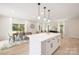 Open living space combining the kitchen, dining room and living room, perfect for modern living and entertaining at 515 Dixie Dr, Mooresville, NC 28115