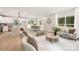 Open-concept design with a modern kitchen, dining area, and inviting living room flooded with natural light at 515 Dixie Dr, Mooresville, NC 28115
