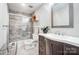 Updated bathroom with tiled shower, vanity with a sink, and modern fixtures at 520 Beacon Knoll Ln, Fort Mill, SC 29708