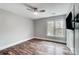 Cozy bedroom with wood floors, neutral paint, and double windows with a view at 520 Beacon Knoll Ln, Fort Mill, SC 29708
