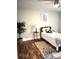 This is a bedroom offering a hardwood floor, side table and window at 520 Beacon Knoll Ln, Fort Mill, SC 29708