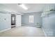 Bright laundry room with tile floors, ample space, and a window for natural light at 520 Beacon Knoll Ln, Fort Mill, SC 29708