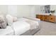 Comfortable bedroom featuring neutral tones, a plush bed, and wooden dresser at 5540 Pamplona Way, Charlotte, NC 28214