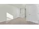 Versatile bonus room provides additional living space with neutral carpet flooring at 5540 Pamplona Way, Charlotte, NC 28214