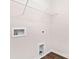 Functional laundry room with wire shelving for efficient storage solutions at 5540 Pamplona Way, Charlotte, NC 28214