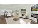 Bright open-concept living room showcasing seamless flow to the modern kitchen at 5540 Pamplona Way, Charlotte, NC 28214