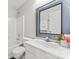 Nicely appointed bathroom features white vanity and shower/tub combo at 8309 Shinkansen Dr, Charlotte, NC 28213
