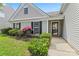 Inviting entrance to a well-maintained home with a beautifully landscaped front yard at 8309 Shinkansen Dr, Charlotte, NC 28213