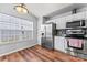Bright eat-in kitchen with stainless steel appliances and plenty of natural light at 8309 Shinkansen Dr, Charlotte, NC 28213