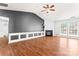 Spacious living room with a fireplace, hardwood floors, and plenty of natural light at 8309 Shinkansen Dr, Charlotte, NC 28213