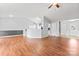 Open-concept living space with neutral colors and access to kitchen and entry at 8309 Shinkansen Dr, Charlotte, NC 28213